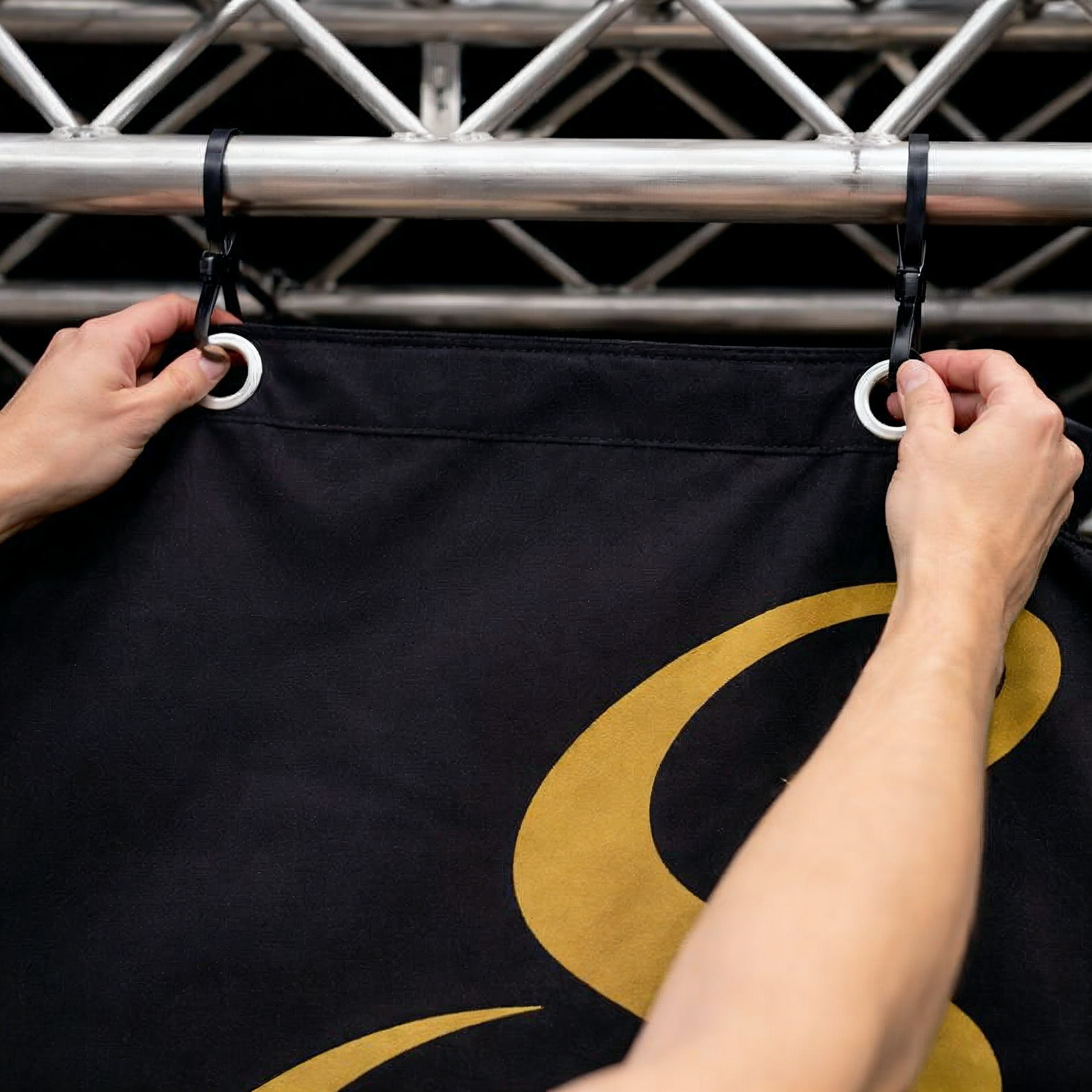 Large custom stage backdrop with reinforced edges and eyelets